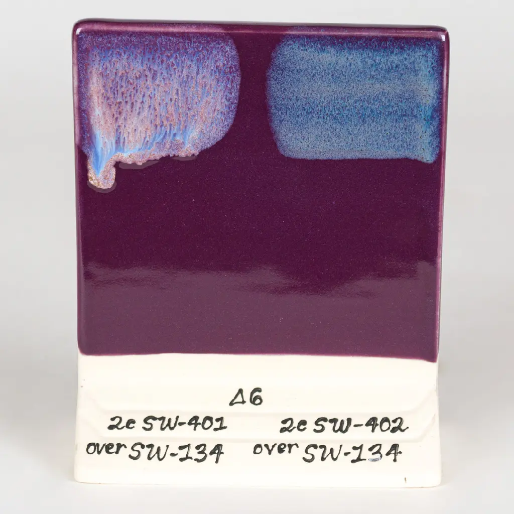 Eggplant Under SW-401 Light Flux (left) and SW-402 Dark Flux (right), Cone 6