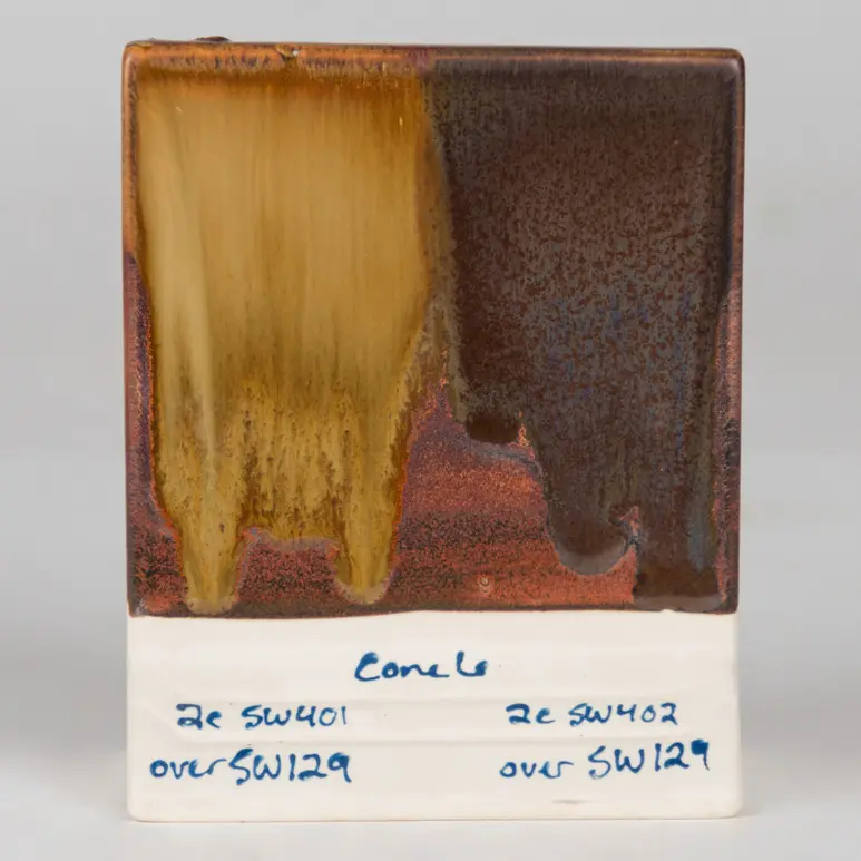 Copper Float Under SW-401 Light Flux (left) and SW-402 Dark Flux (right), Cone 6