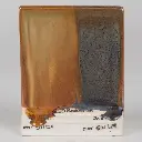 Copper Float Under SW-401 Light Flux (left) and SW-402 Dark Flux (right), Cone 10