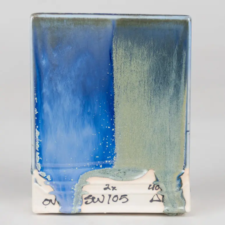 Frost Blue, Under SW-401 Light Flux (left) and SW-402 Dark Flux (right), Cone 10 reduction