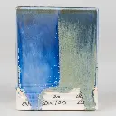 Frost Blue, Under SW-401 Light Flux (left) and SW-402 Dark Flux (right), Cone 10 reduction